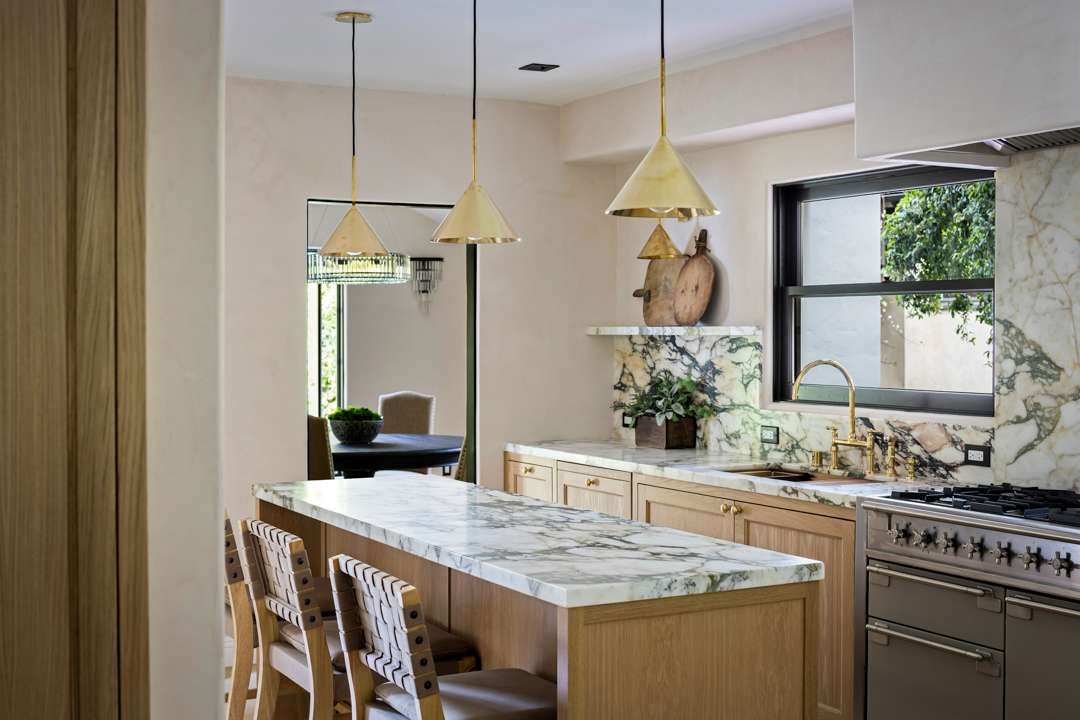 Bob Barker Former LA Home Kitchen With Marble Island and Backsplash