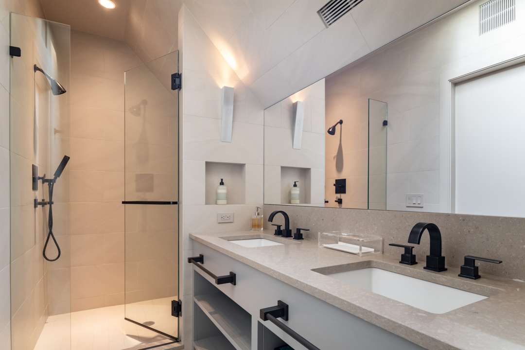 Neutral bathroom with black faucets