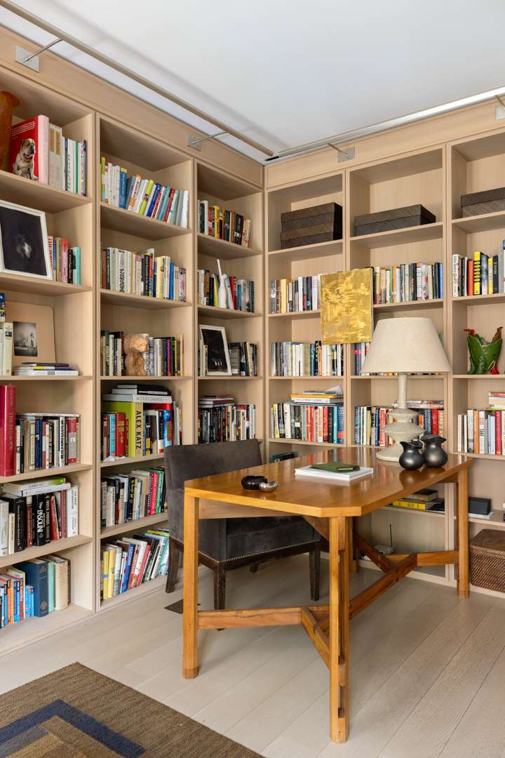 Wood and beige office with built in shelves