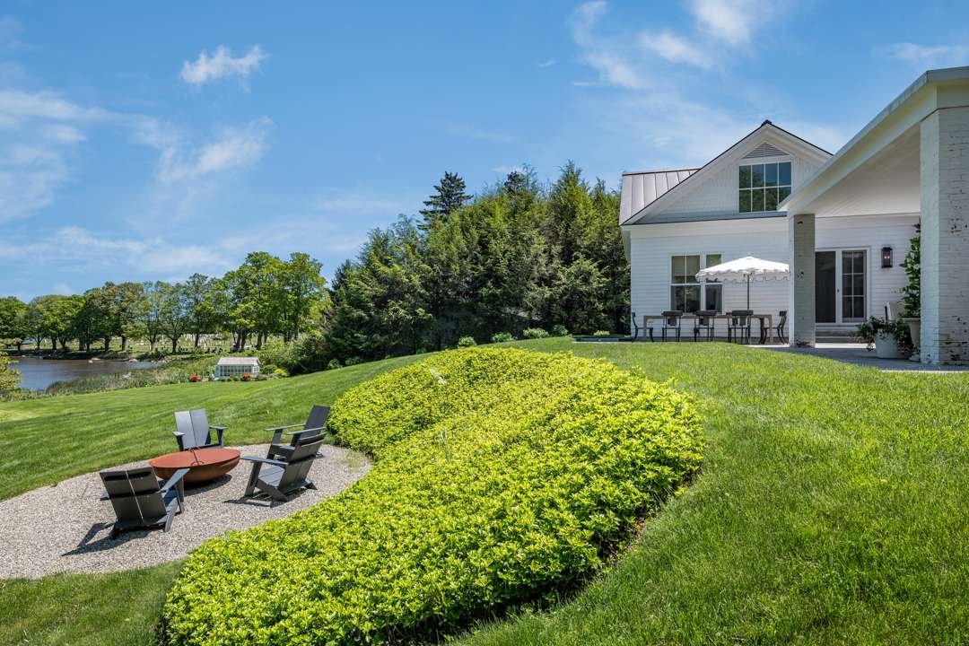 River front backyard with fire pit