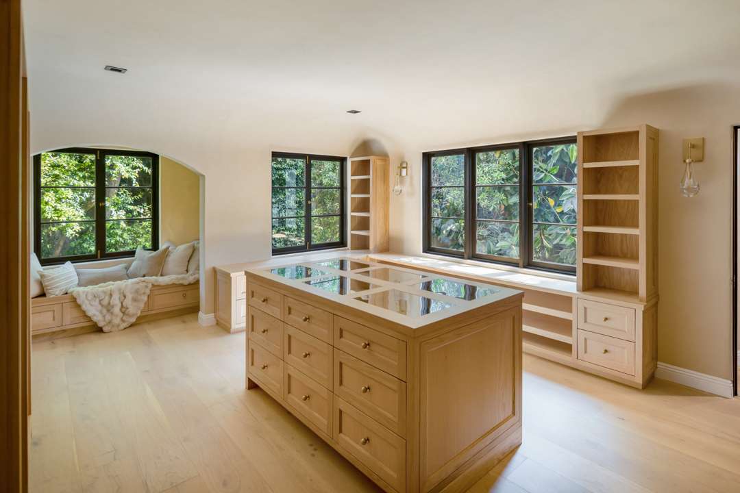 Bob Barker Former LA Home Closet with Wood Shelving