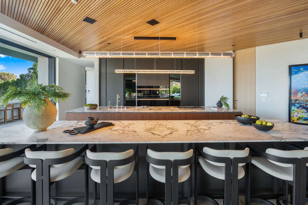 Marble island and counters in kitchen