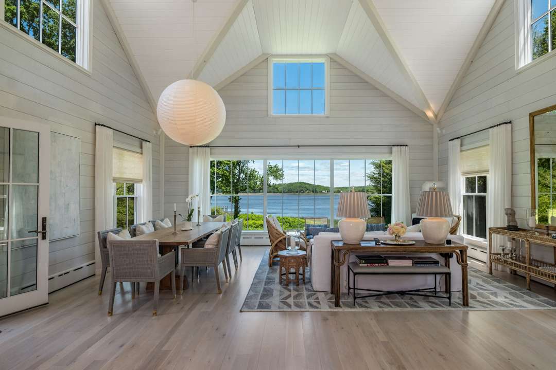 Sun room with blue and white furnishings