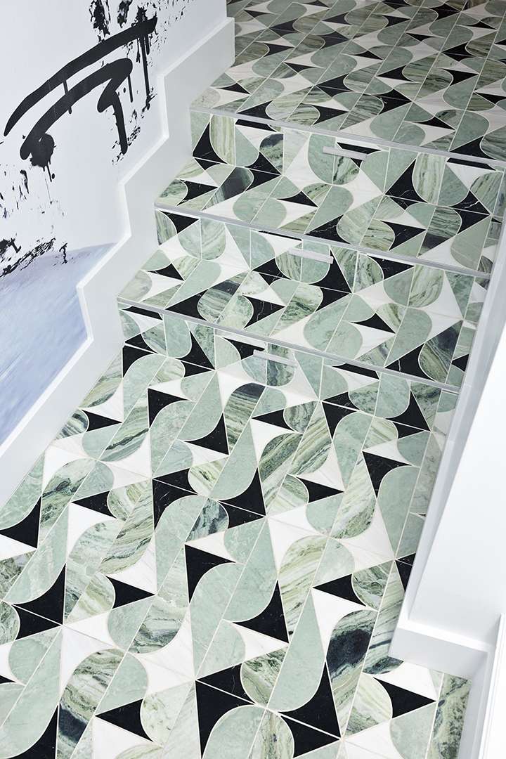 Green, black, and white marble stairs