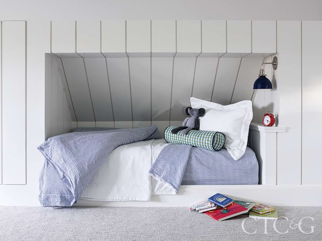 Kids bedroom with blue bedding