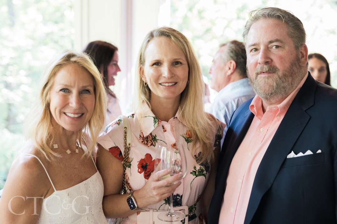 Lisa Heissan, Maria Aspillaga, and Brandon Jones at Champagne on the Deck