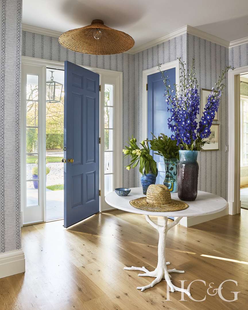 Hamptons home blue and white foyer