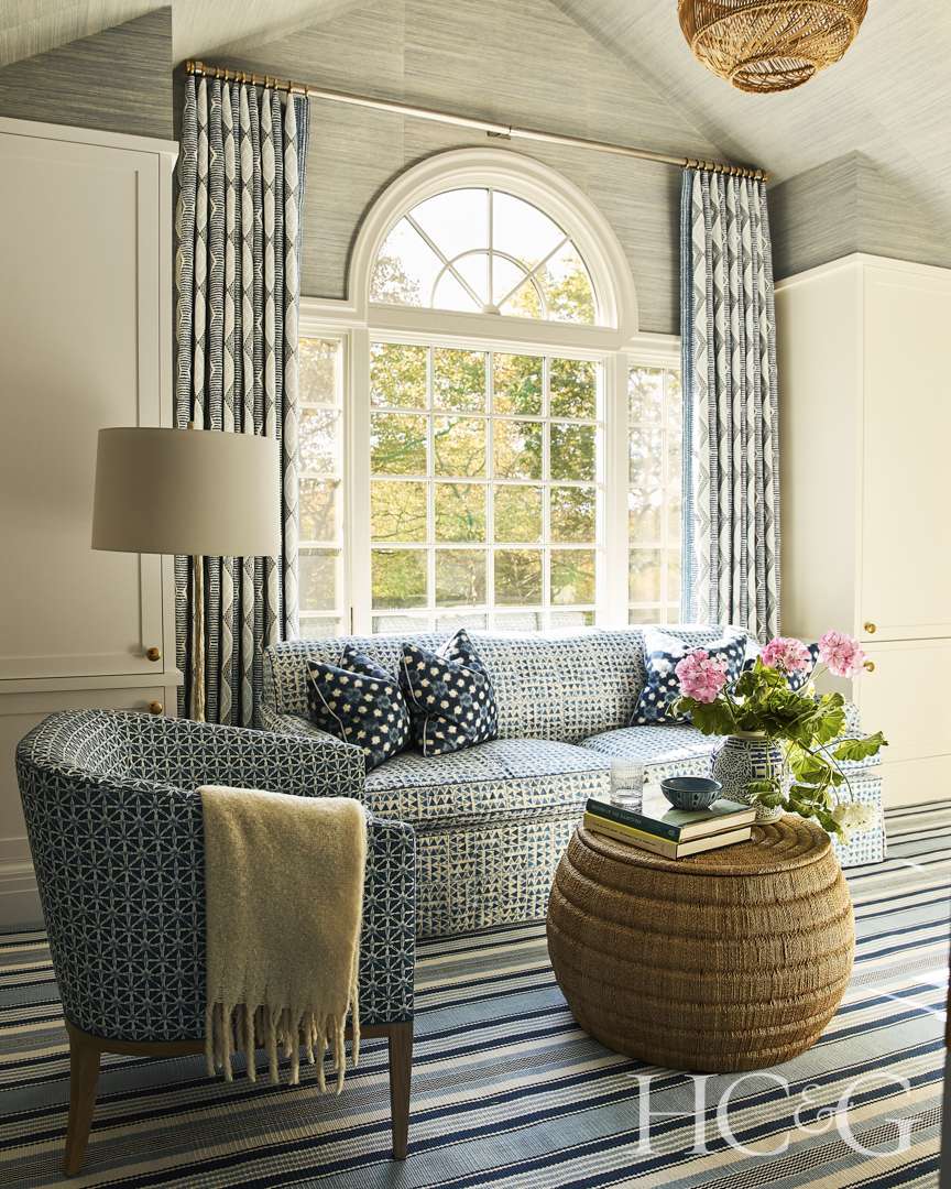 Hamptons home blue and white patterned living room
