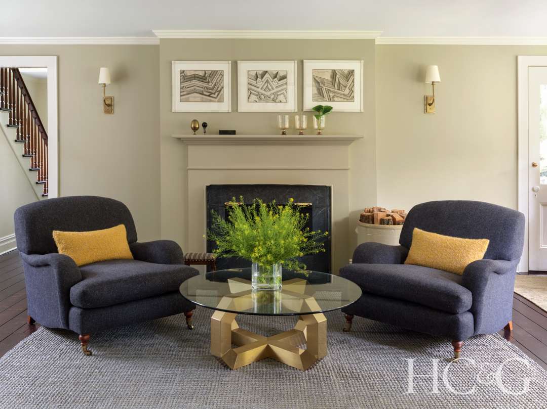 Bellport home blue and yellow living room