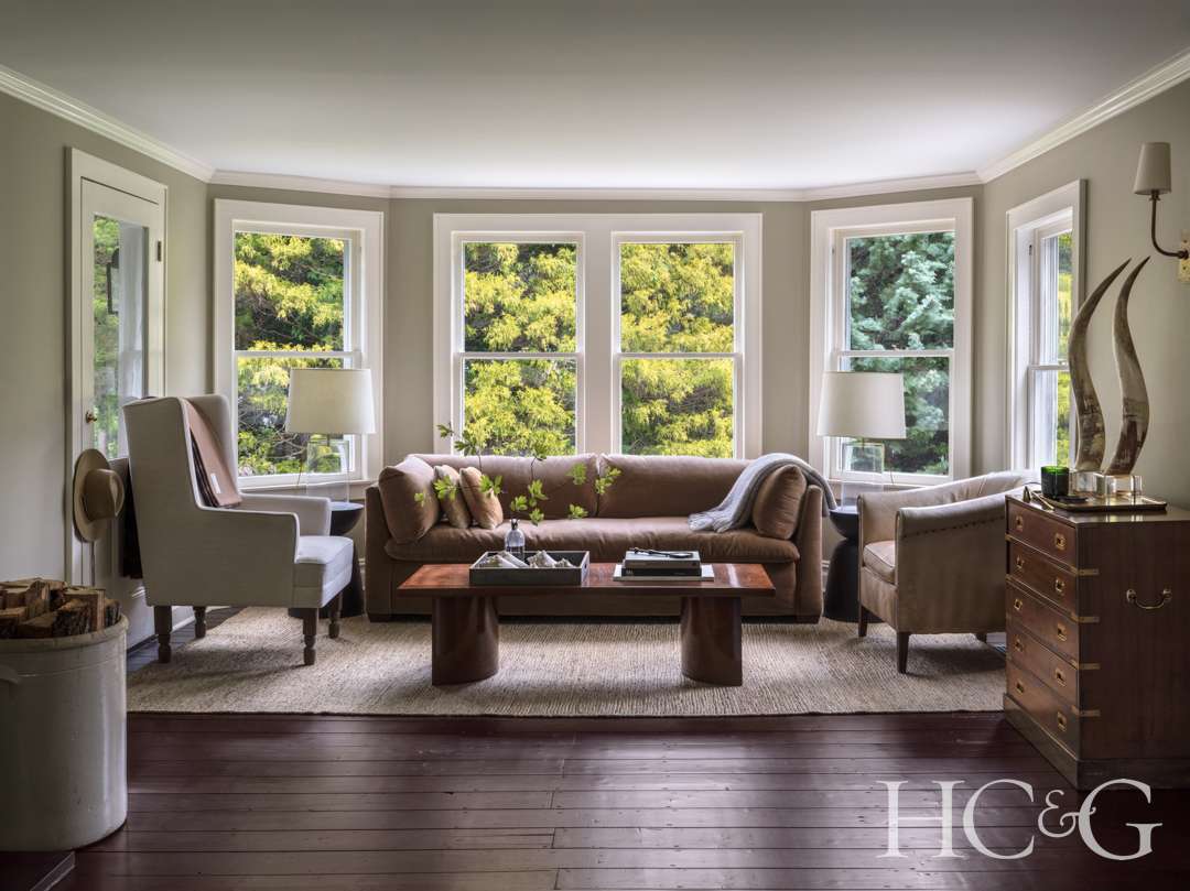 Bellport home brown and white living room