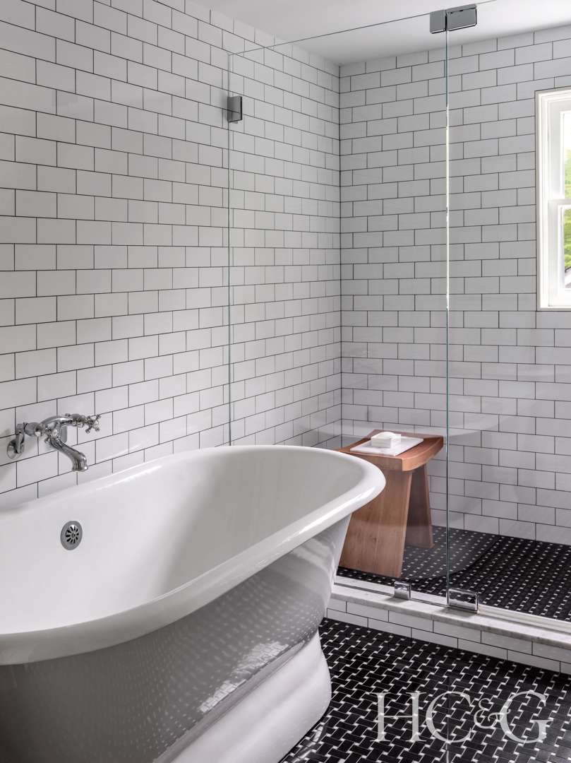 Bellport house bathroom with vintage tub