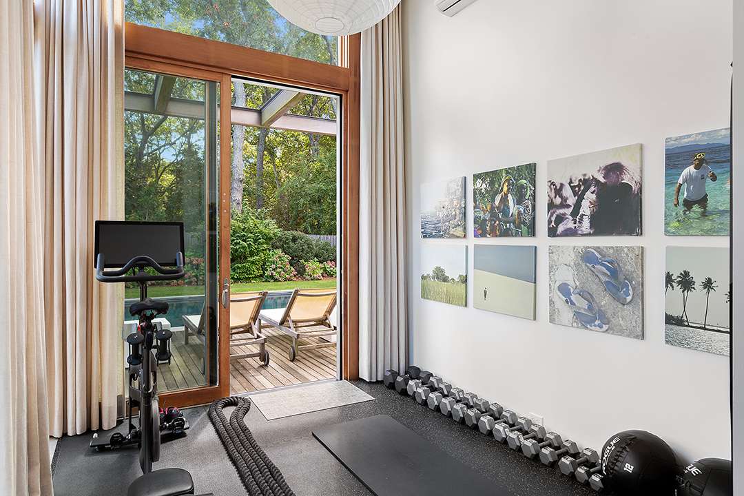 Exercise room with access to outdoor pool