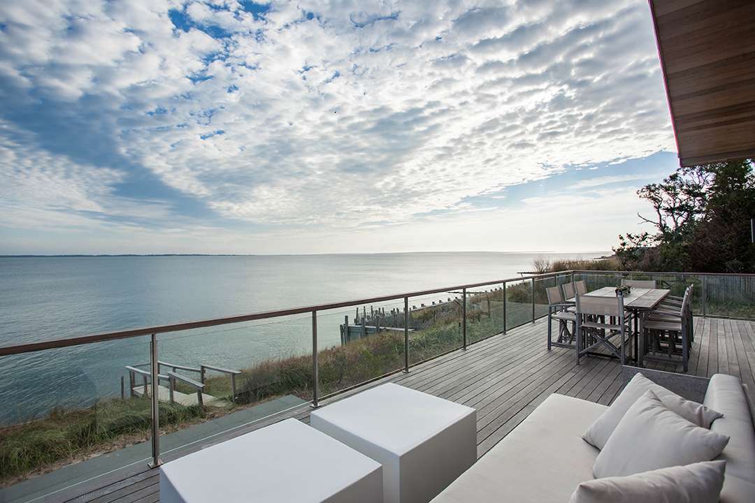 East Hampton neutral wood deck overlooking the bay