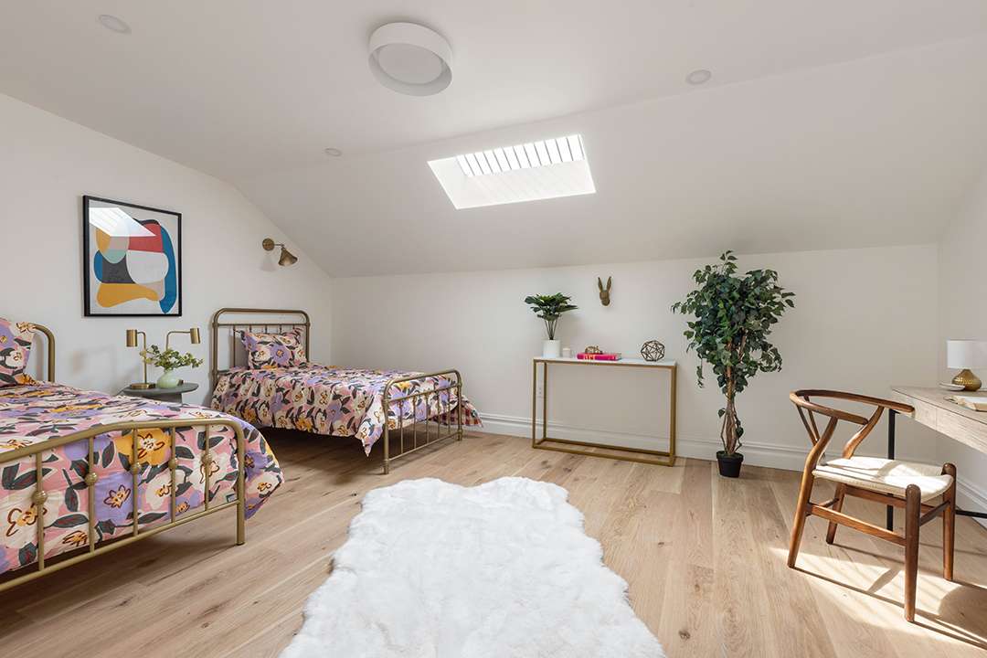Bedroom with Two Twin Beds with Floral Bedding