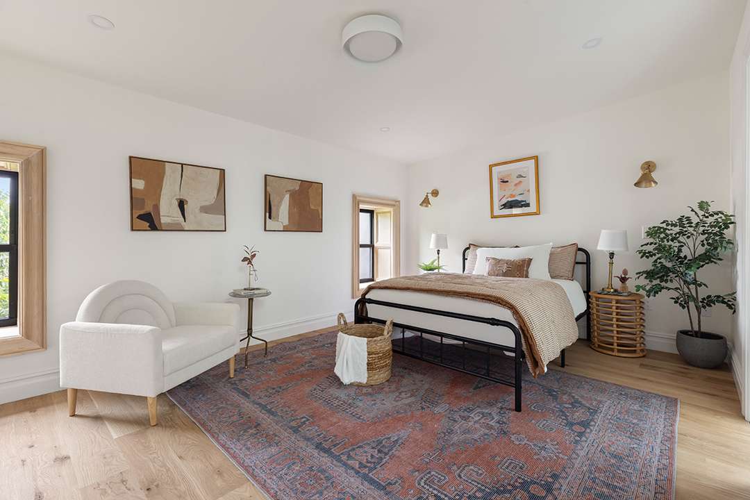 Modern Brownstone Bedroom with Pops of Color