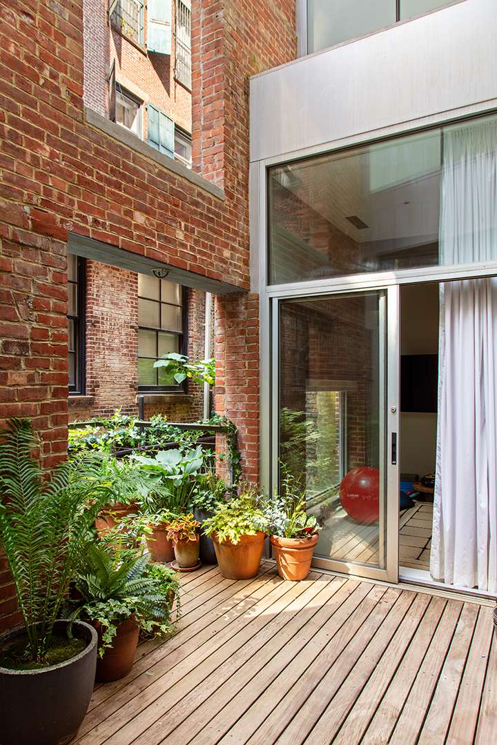 Wood deck with small potted garden