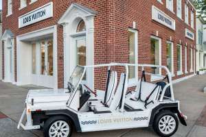 Louis Vuitton jeep outside storefront