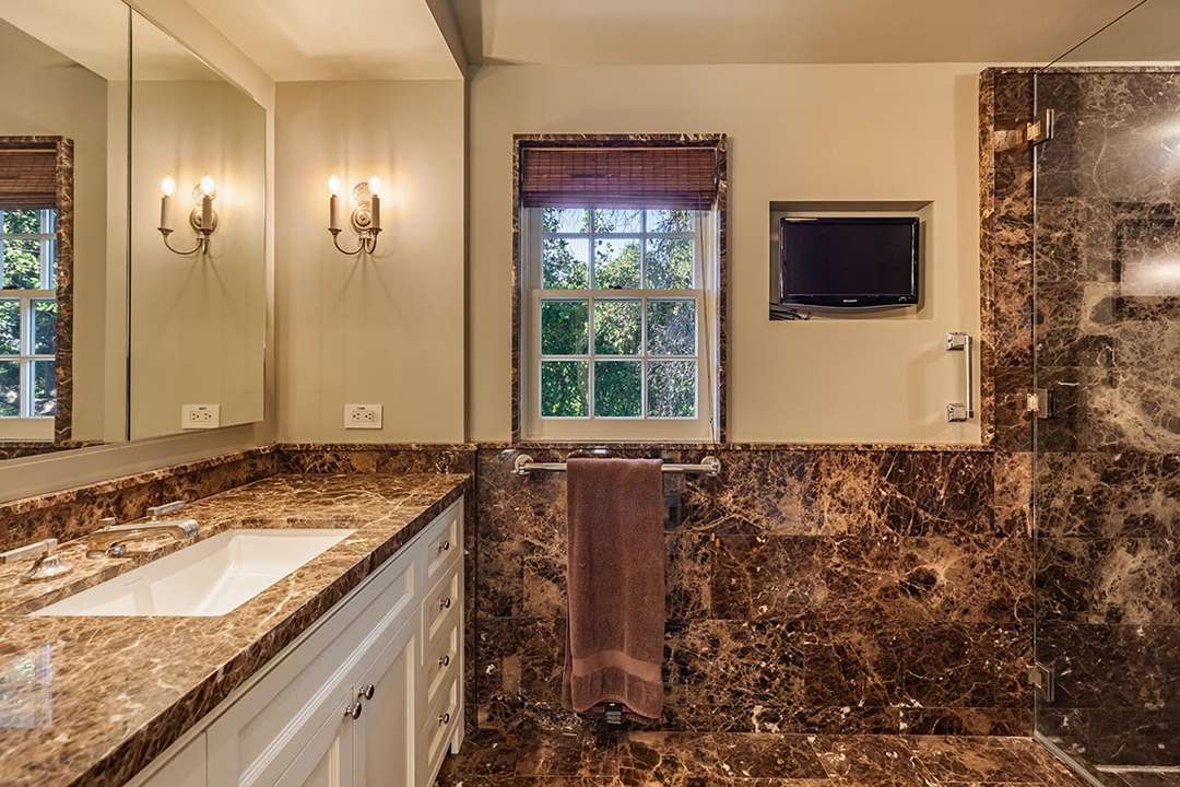 Brown marble bathroom at Audrey Hepburn's former LA mansion