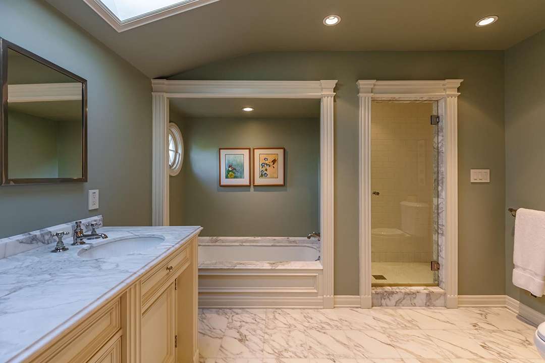 Bathroom with marble counters and floors at Audrey Hepburn's former LA mansion