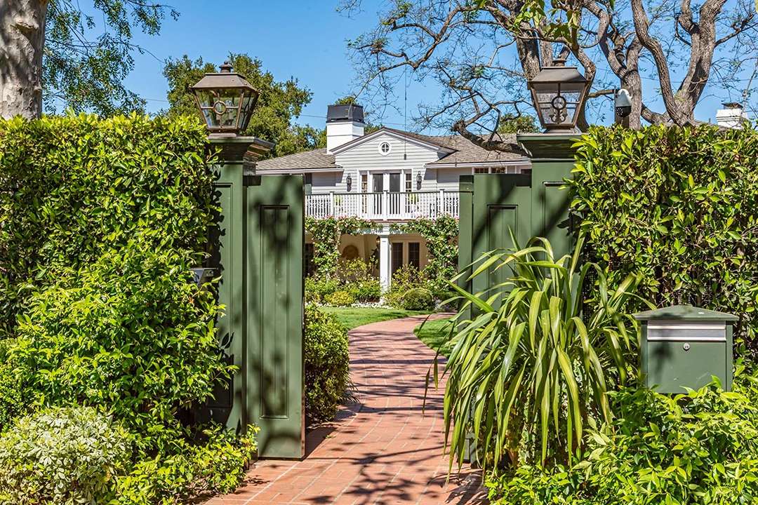 Green fence at Audrey Hepburn's former LA mansion