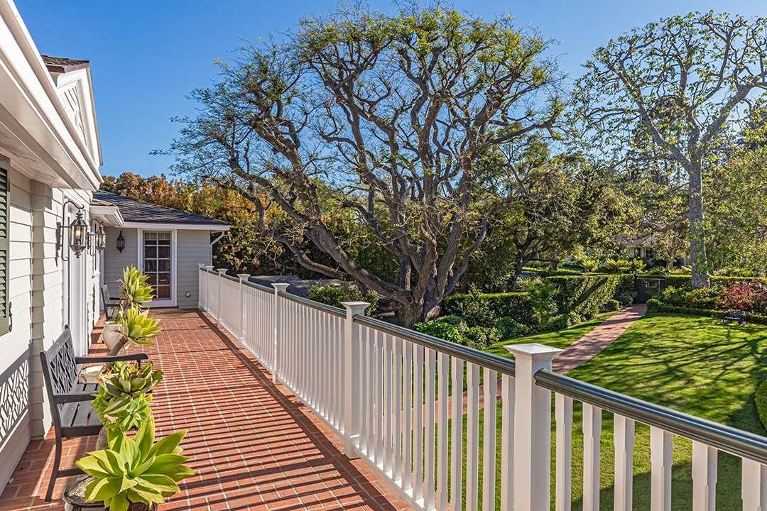 Balcony with brick floor at Audrey Hepburn's former LA mansion