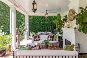 Outdoor living room with fire place at Audrey Hepburn's former LA mansion