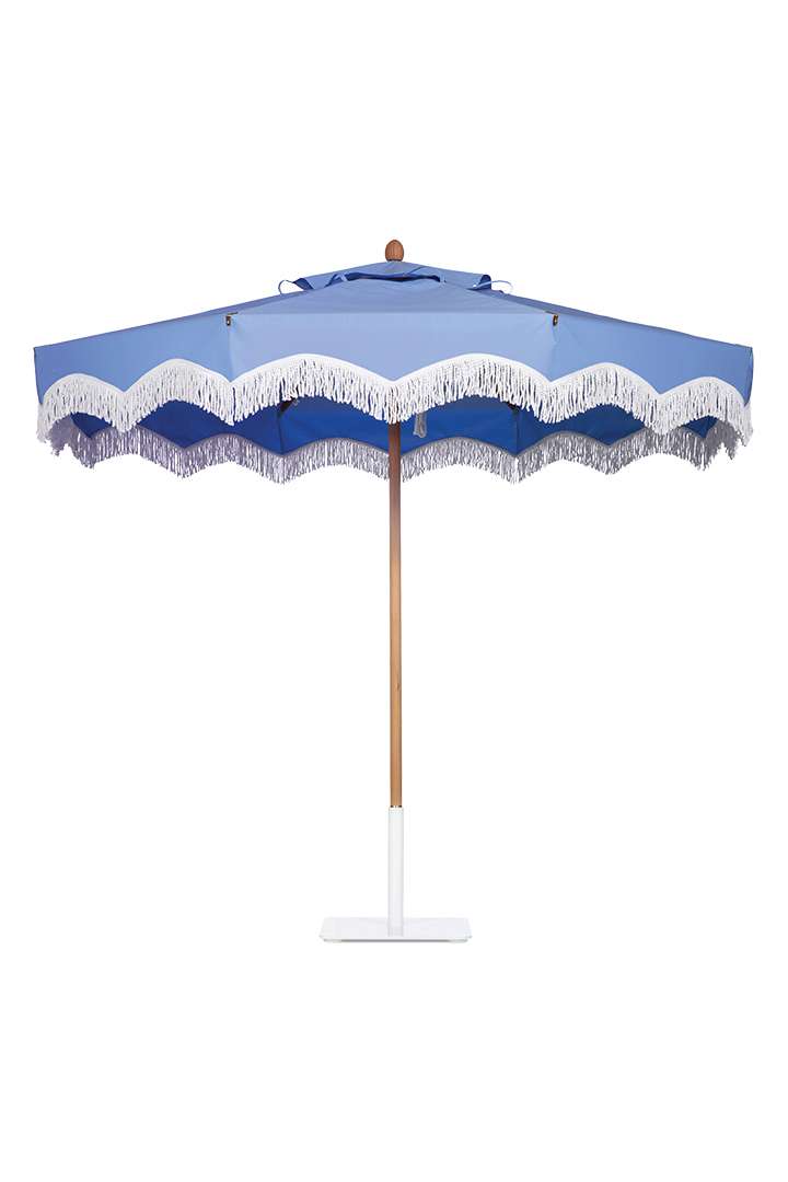 Blue umbrella with white fringe