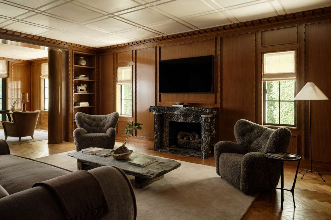 A marble fireplace is the star of this Beverly Hills home's sitting room