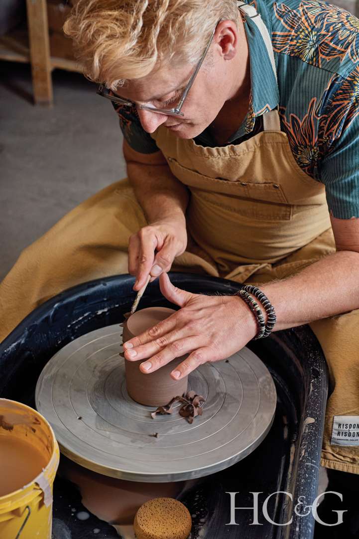 Ceramicist Brian Burgess using potter's wheel