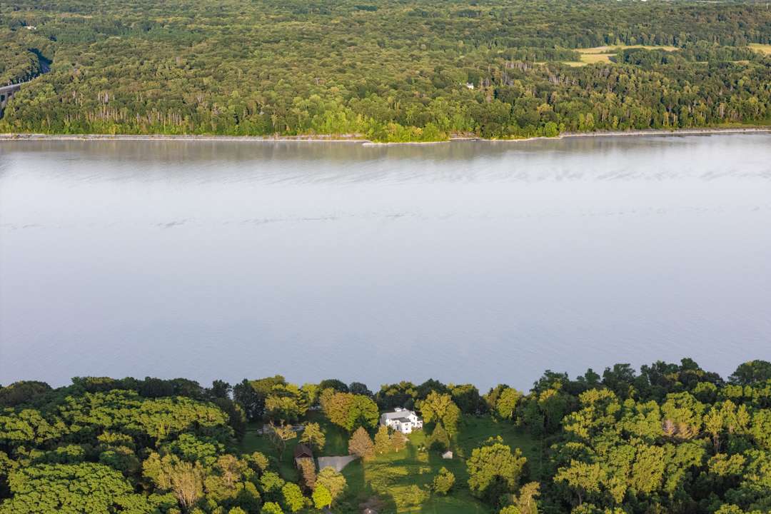 Sweeping aerial views of estate along the Hudson River