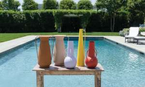 Colorful home furnishing decor in front of Southhampton pool