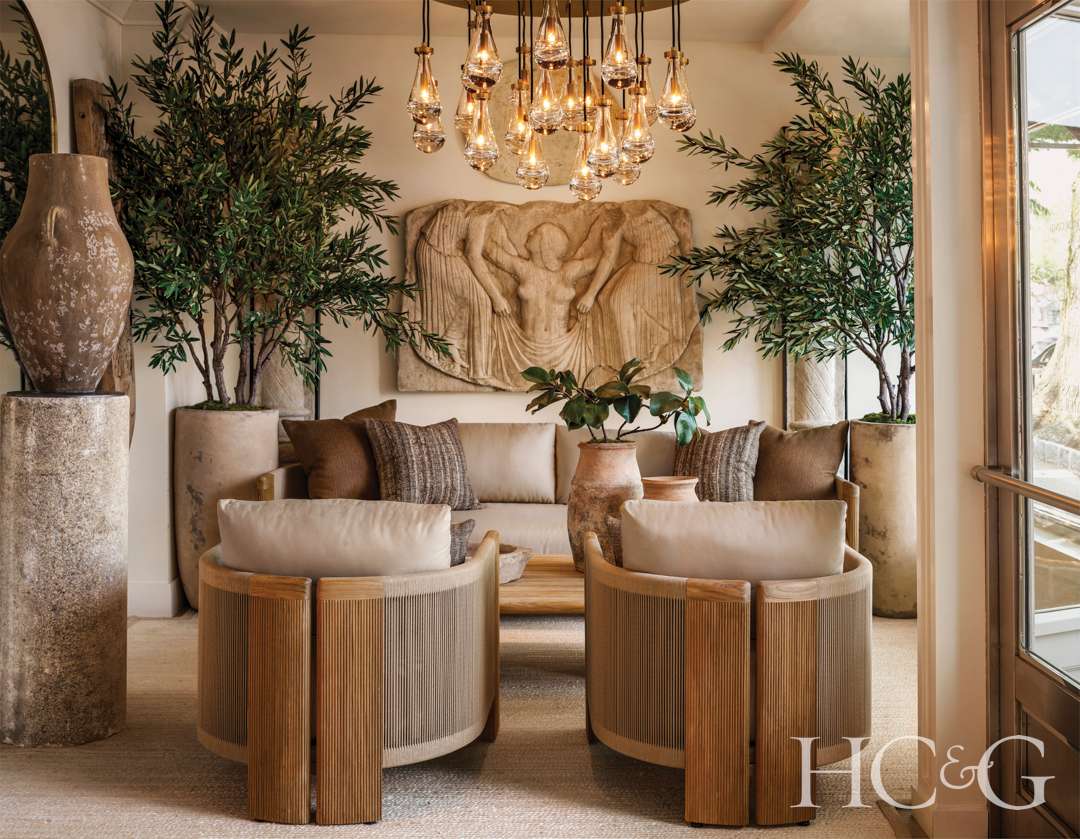 Teak couch, coffee table, and lounge chairs