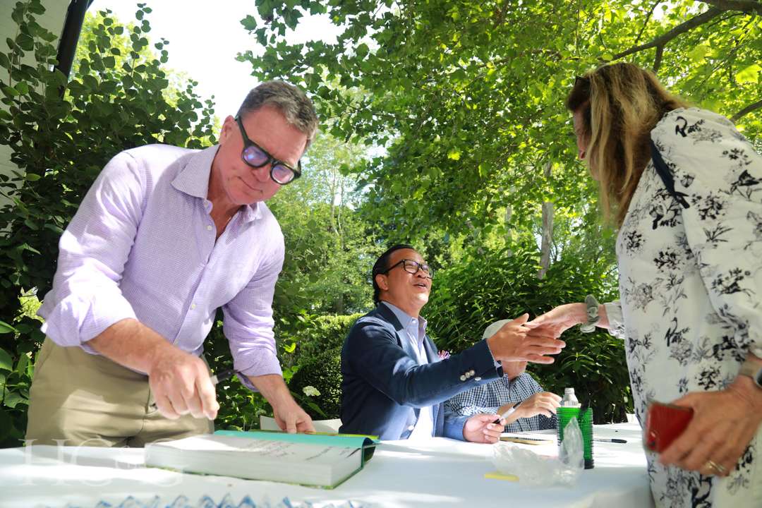 Fernando Wong greeting guest at East Hampton Art & Design Days