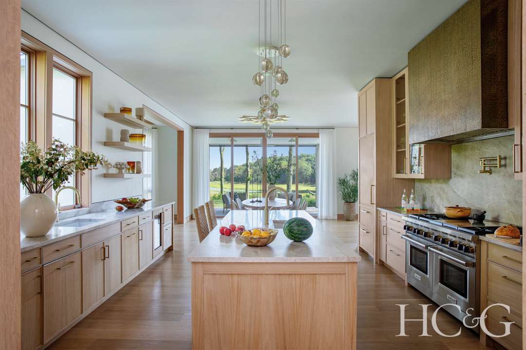 Spacious kitchen with light toned cabinetry