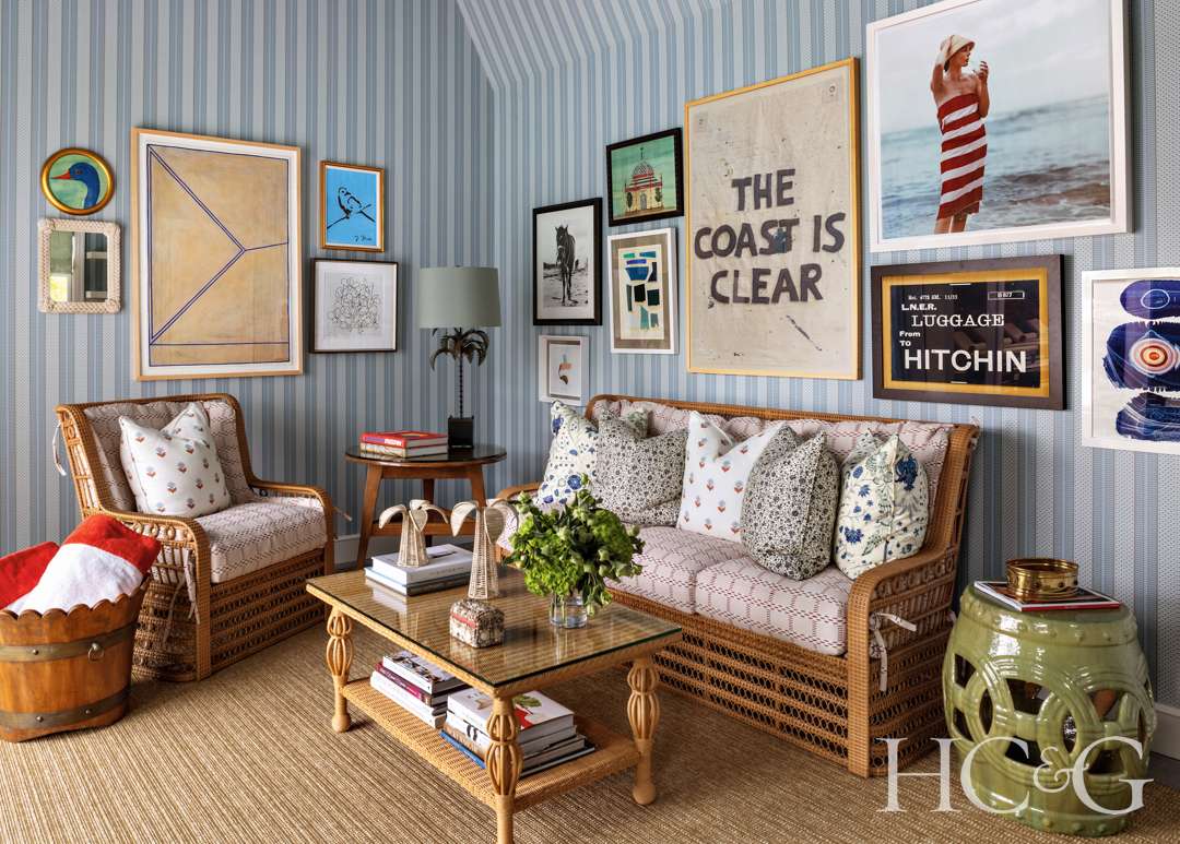Striped sitting room with art-covered walls