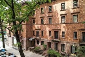 Bob Dylan’s Former Harlem Townhouse on Historic Strivers’ Row Comes to Market