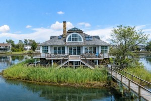 This $11M Island Beauty in Old Greenwich Is Perfect for Those Craving Private, Coastal Living