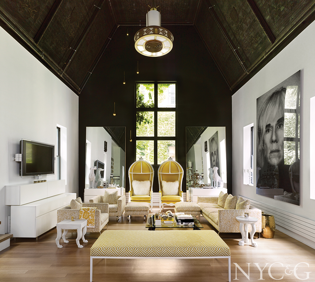 Lofty living room with a black-and-white portrait of Andy Warhol