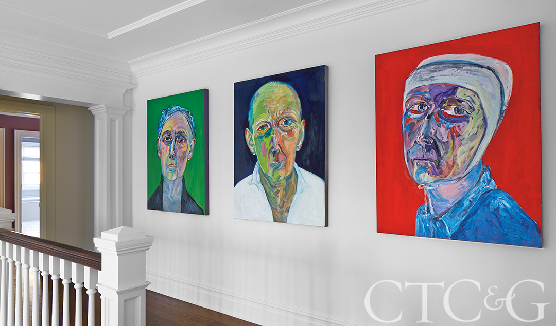 Colorful portraits in hallway