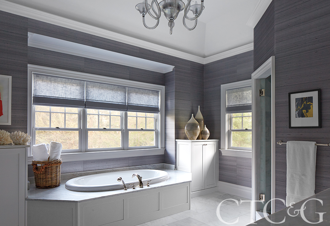 Grey and white bathroom with built-in tub