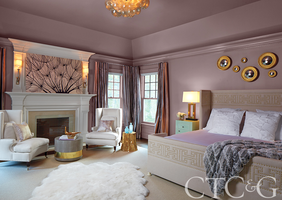 Pink, purple, and white themed primary bedroom