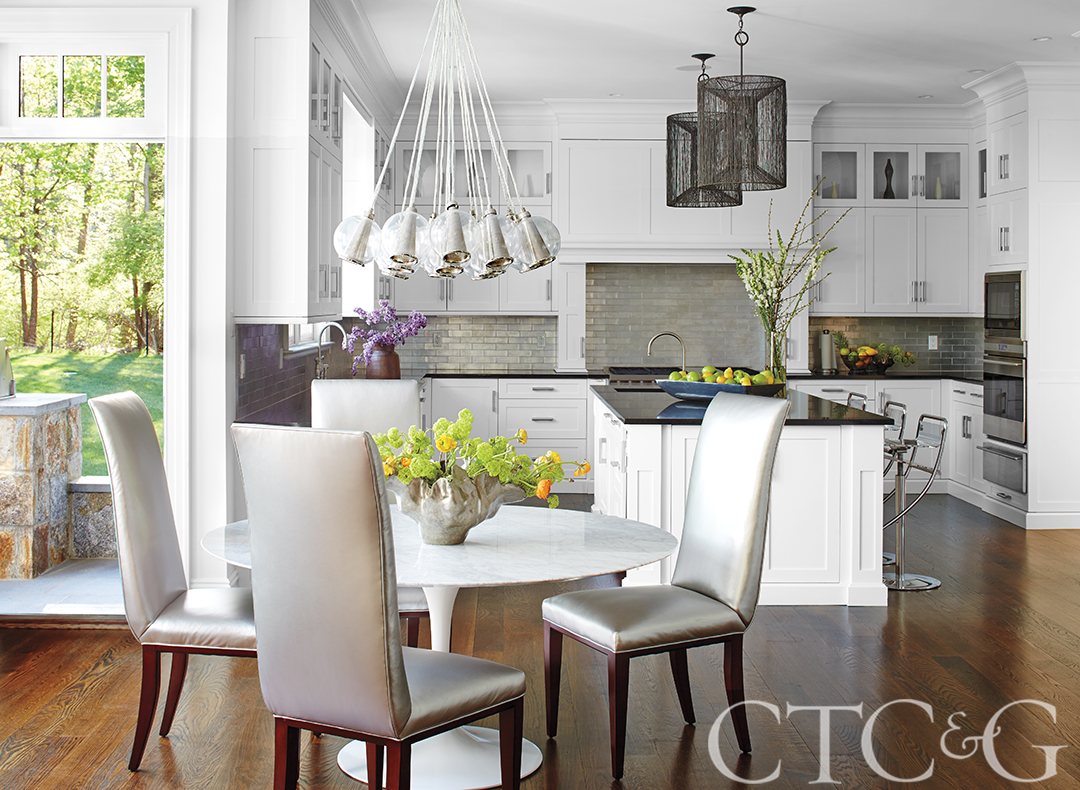 Silver dining chairs in kitchen breakfast nook