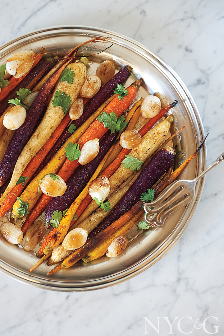 Pearl onions garnish caramelized cumin-roasted carrots.