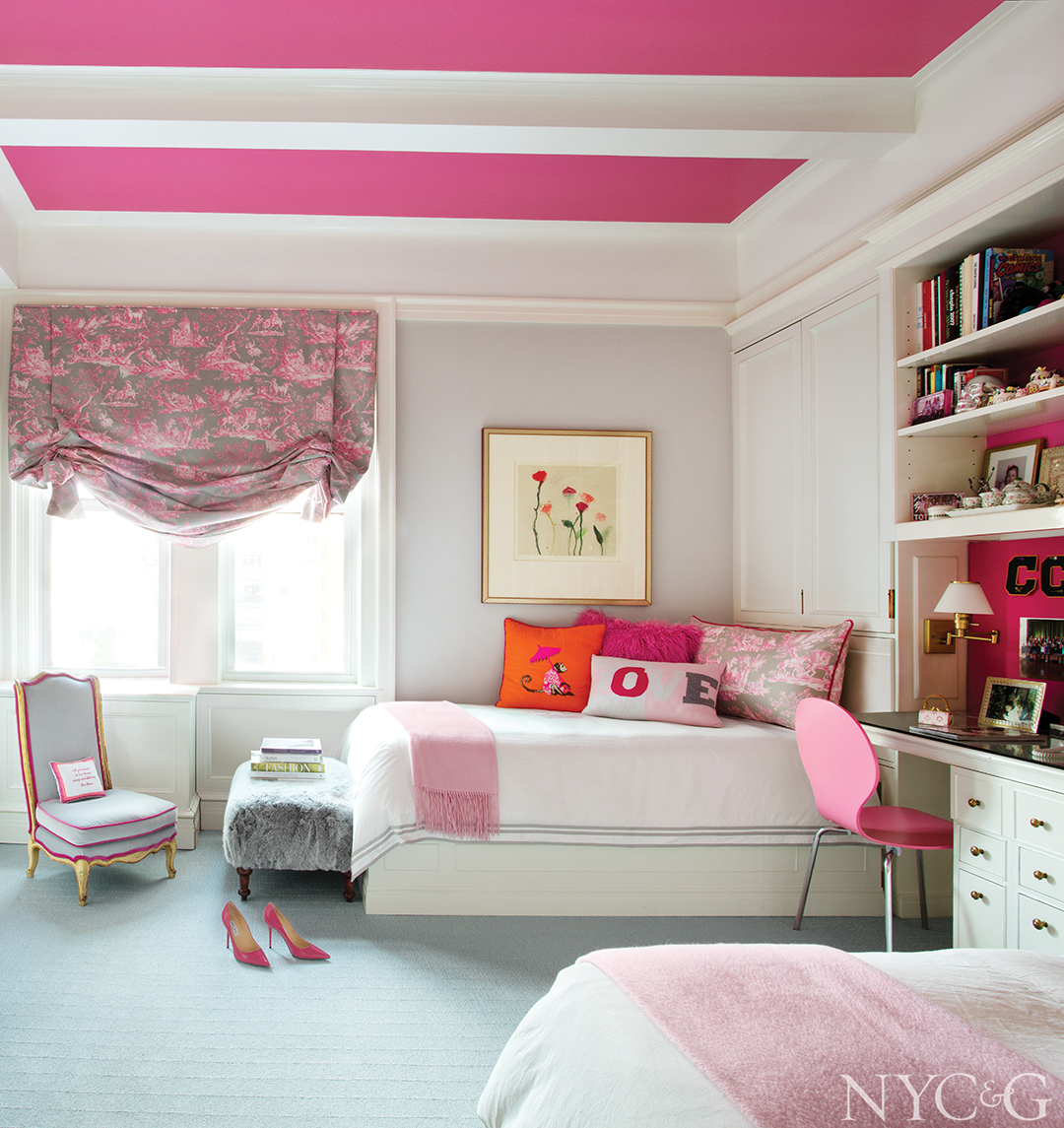 Daughter's bedroom has a pink Roman shade