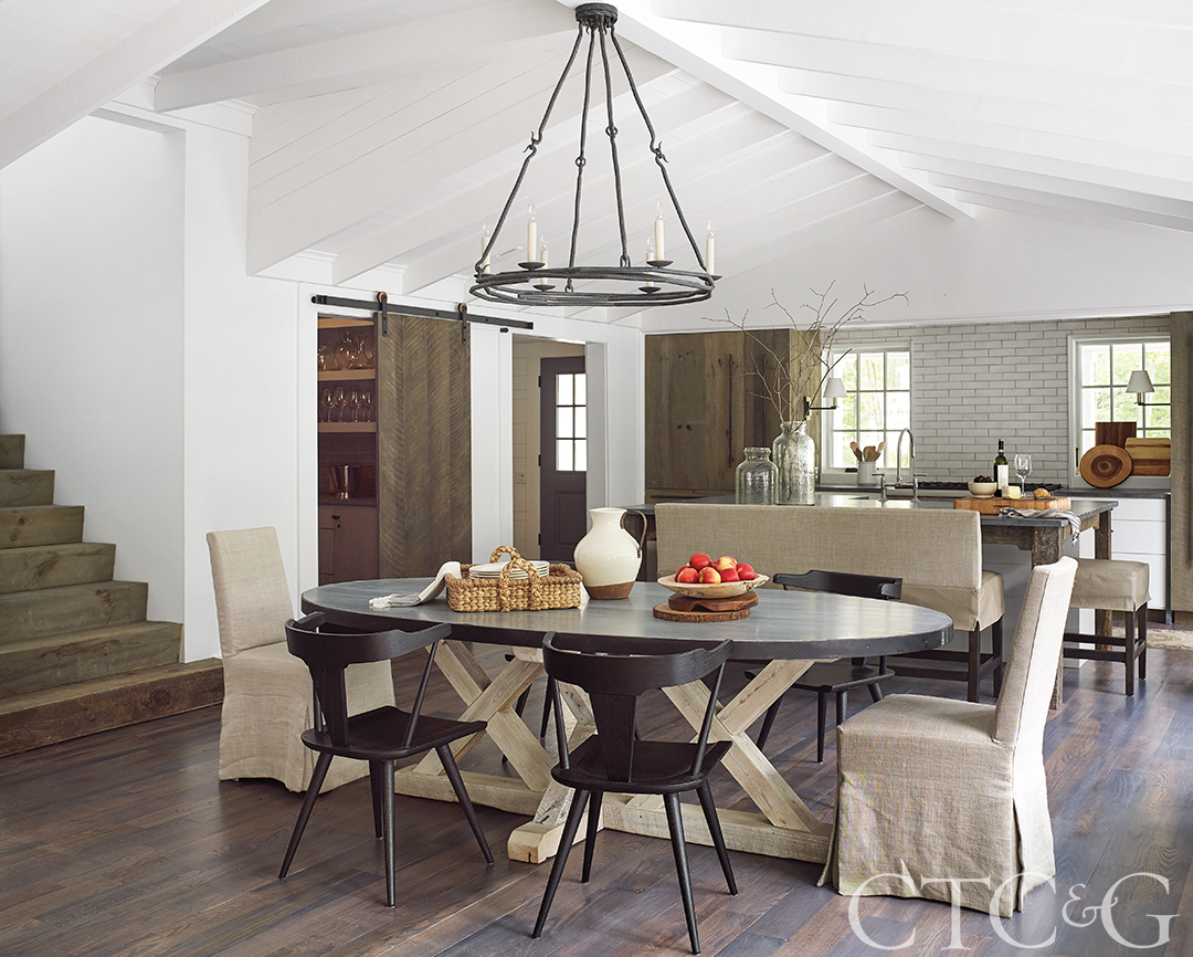 Beige and brown Vermont dining room with wood table and chairs