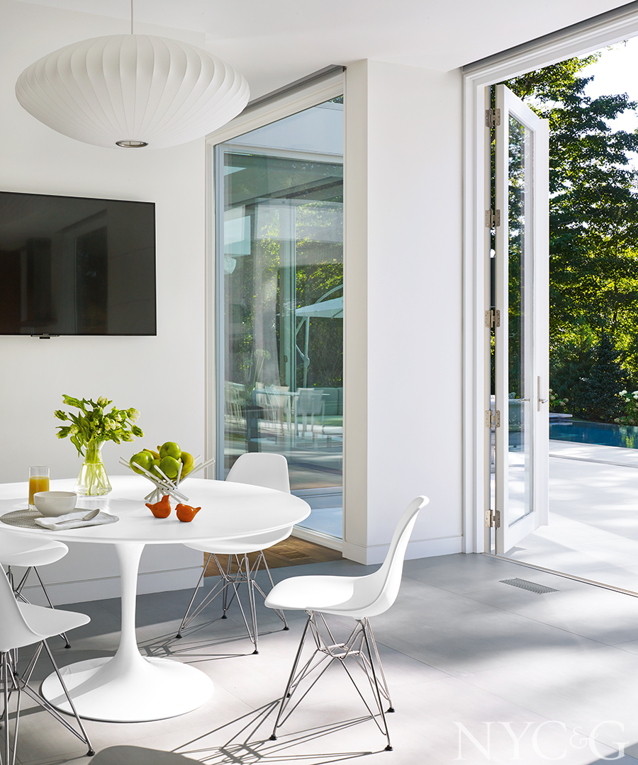 Lustrous dining room which opens onto the pool