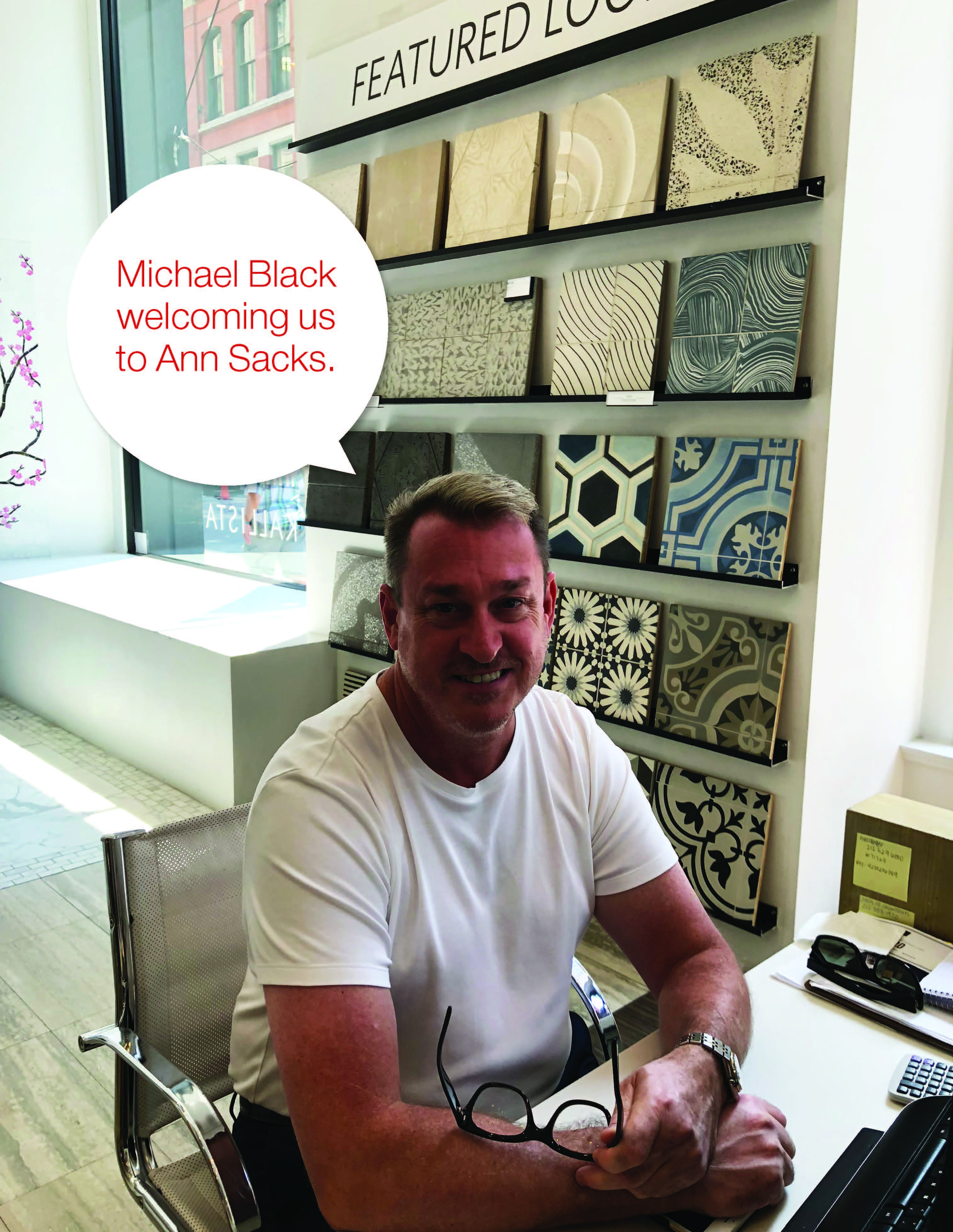 Michael Black in front of colorful patterned Ann Sacks tiles