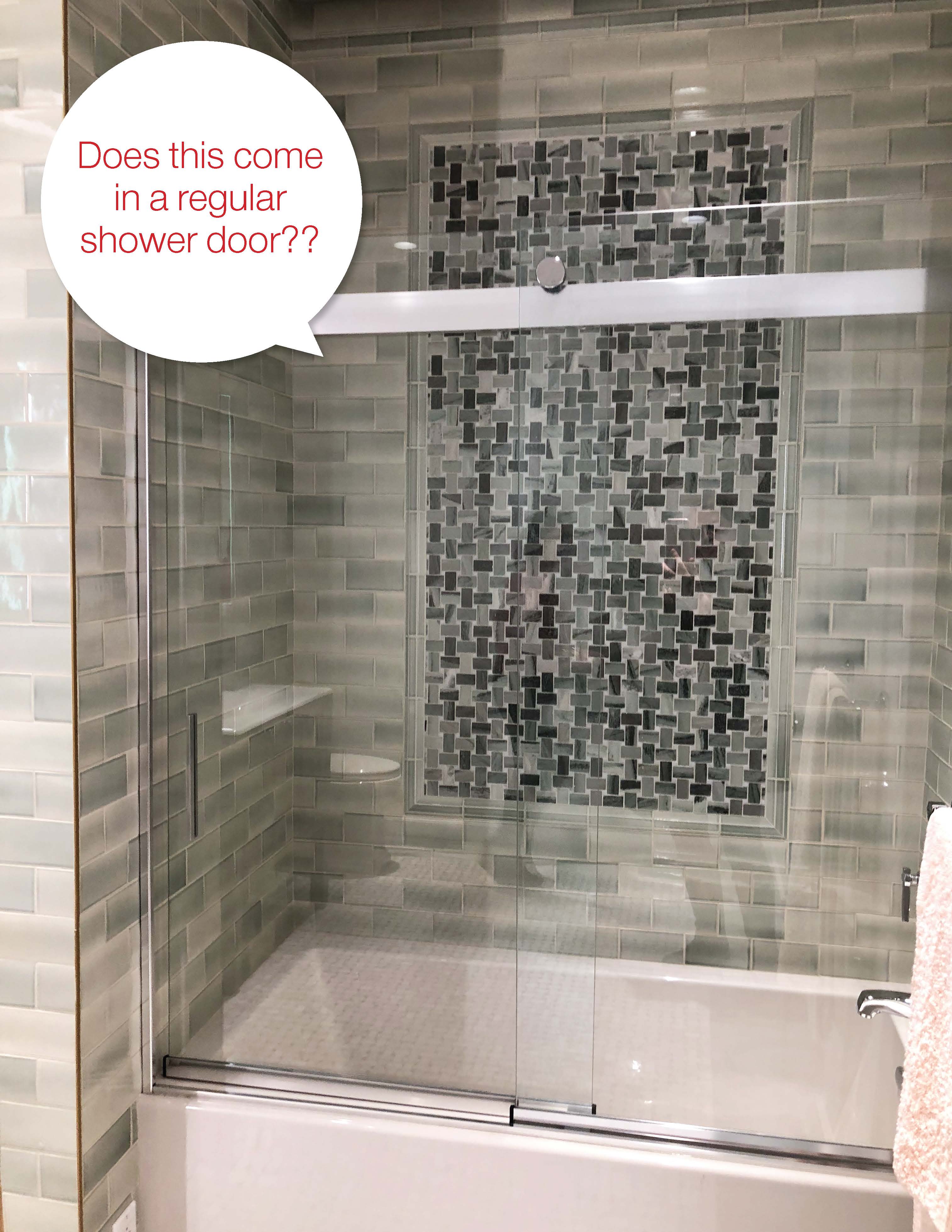 Sliding shower door with black and grey mosaic tiles