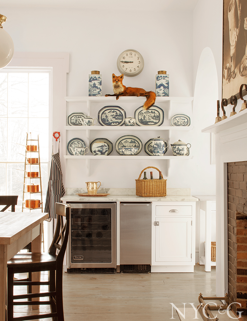 Taxidermy fox overlooks chic kitchen